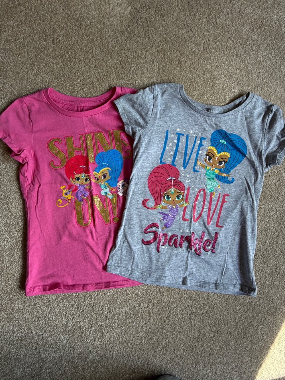 Pair of Shimmer and Shine Shirts